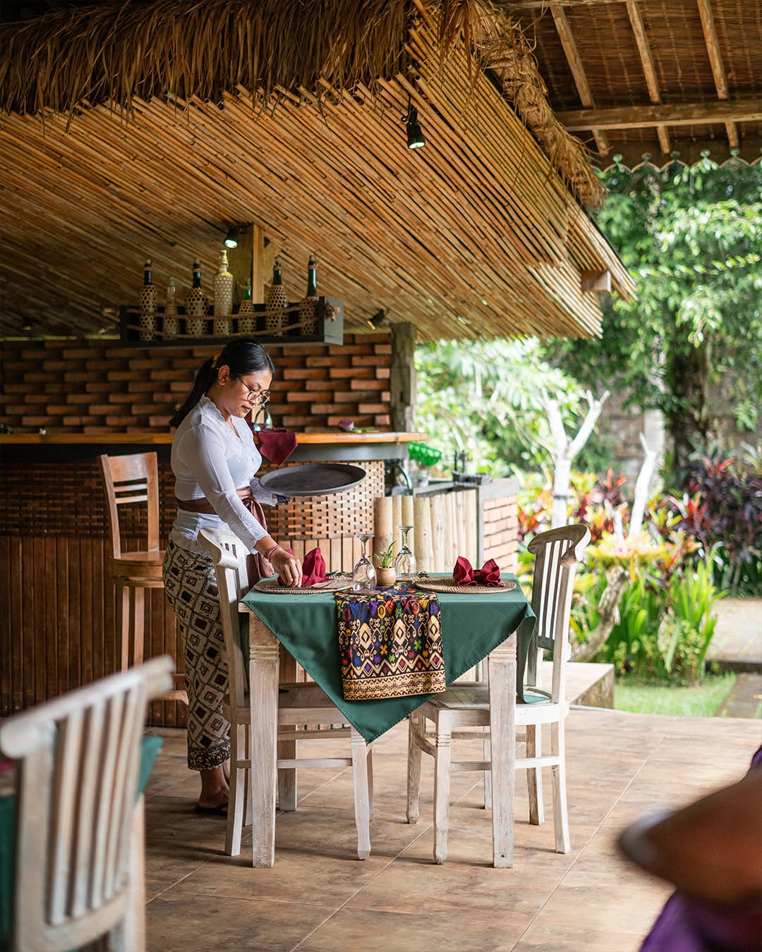 staff serving foods in restaurant